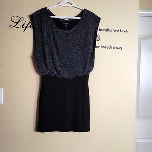 Large size, black and sequin mini dress from Le Chateau.